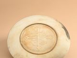 an image of a white plate with a cross on it