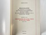 an open book with a red border on the front of it