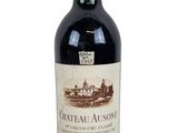 a bottle of wine that is sitting on a table