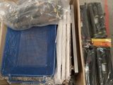 a lot of items in a box on the floor