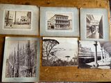 several old black and white photos of buildings and a person holding an umbrella
