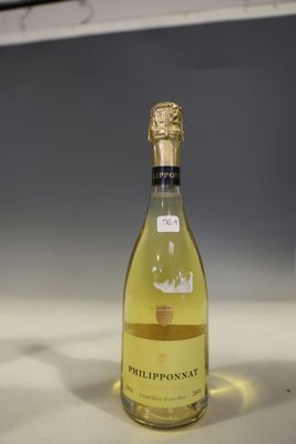 a bottle of wine that is sitting on a counter