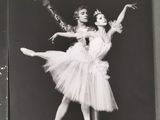 black and white photograph of two ballerinas posing for a picture