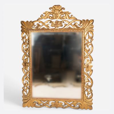 a mirror that is sitting on a table