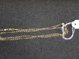 a close up of a chain with a tag attached to it