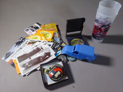 a table with a lot of items and a cup on it