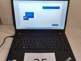 a laptop computer sitting on a table with a price tag attached to it