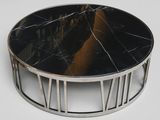 a black marble table with a metal frame around it