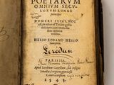 an old book with writing on it sitting on top of a table