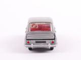 a toy car that is sitting on a white surface