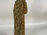 a statue of a woman with a veil on her head