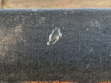 a close up of a piece of fabric with a hole in it