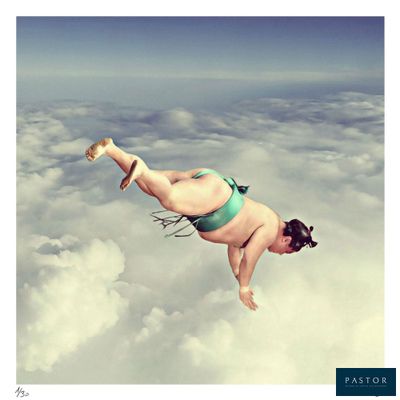 a woman flying through the air in a bikini