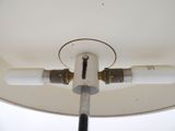 a light that is on a white table with a light on it