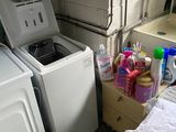 a washer and a dryer in a small room