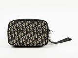 a black and white purse with a monogram pattern on it