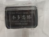 a plastic container with a label on it on a table