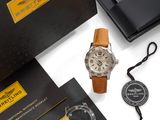 an image of a watch and a watch case on a table