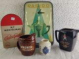 three different types of coffee mugs on a table