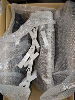a box with a pair of scissors inside of it