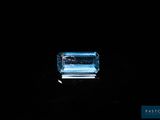 a blue topazte gems on a black background