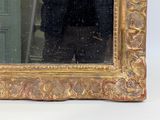 a man taking a picture of himself in a mirror