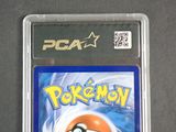 the card is in a clear plastic case with a pokemon logo on it