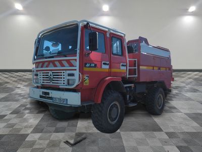 a red truck that is sitting on a checkered floor