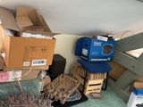 a pile of boxes and boxes on the floor in a room