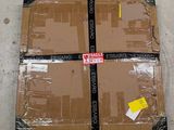 a cardboard box that has been wrapped in plastic