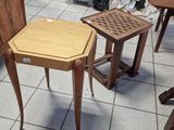 several pieces of furniture are sitting on a tile floor in a room