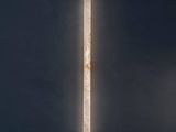 the light is shining on the wall in the dark