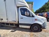 a white truck that is parked in a lot
