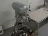 an image of a kitchen with a mixer and a table