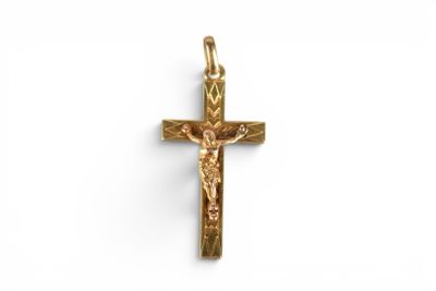 a gold cross with a crucif on it on a white background