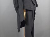 an image of a suit and tie on a mannequin