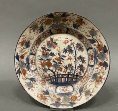 an image of a plate with flowers and birds on it
