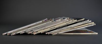 a stack of cds stacked on top of each other