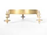 a gold table with a cross on top of it