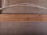 a picture of a wooden loom with a quote on it