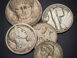 a close up of a bunch of coins sitting on top of a table