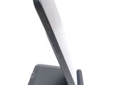 a close up of a cell phone on a stand