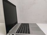 a laptop computer that is sitting on a table
