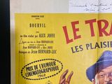 a poster of a man in a blue suit and hat