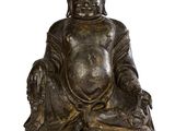 une image représentant une statue de Bouddha assis sur une surface blanche