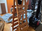a ladder in the middle of a room that is being worked on