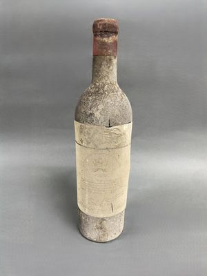 a bottle of wine that is sitting on a table