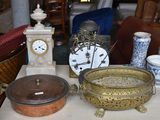 a table with a lot of antique items on it