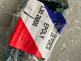 a red, white, and blue sign on a plastic bag