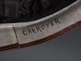 the back of a hat with a label on it that says carry over